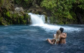 Tourists relaxing in natural thermal pools Sensoria Costa Rica