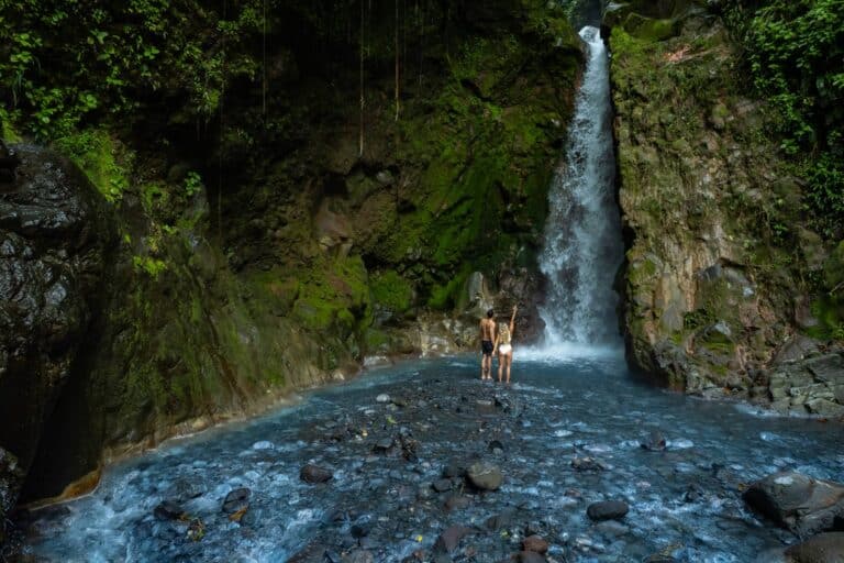 Buenos Aires waterfall cascading into blue pool Costa Rica rainforest